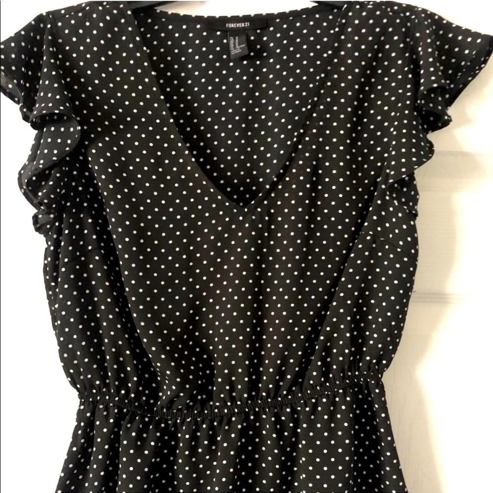 Polka dot ruffle peplum top